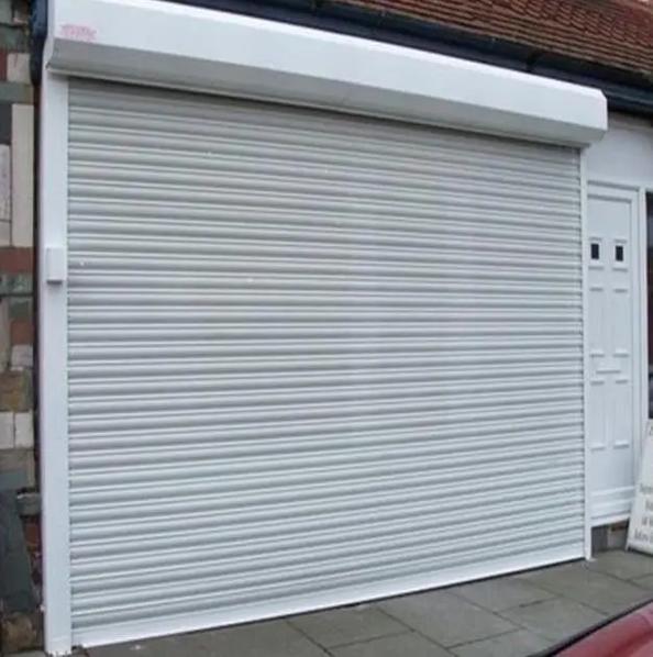 天津恒信電動門有限公司：卷簾門、電動卷簾門及電動車庫門專業制造商